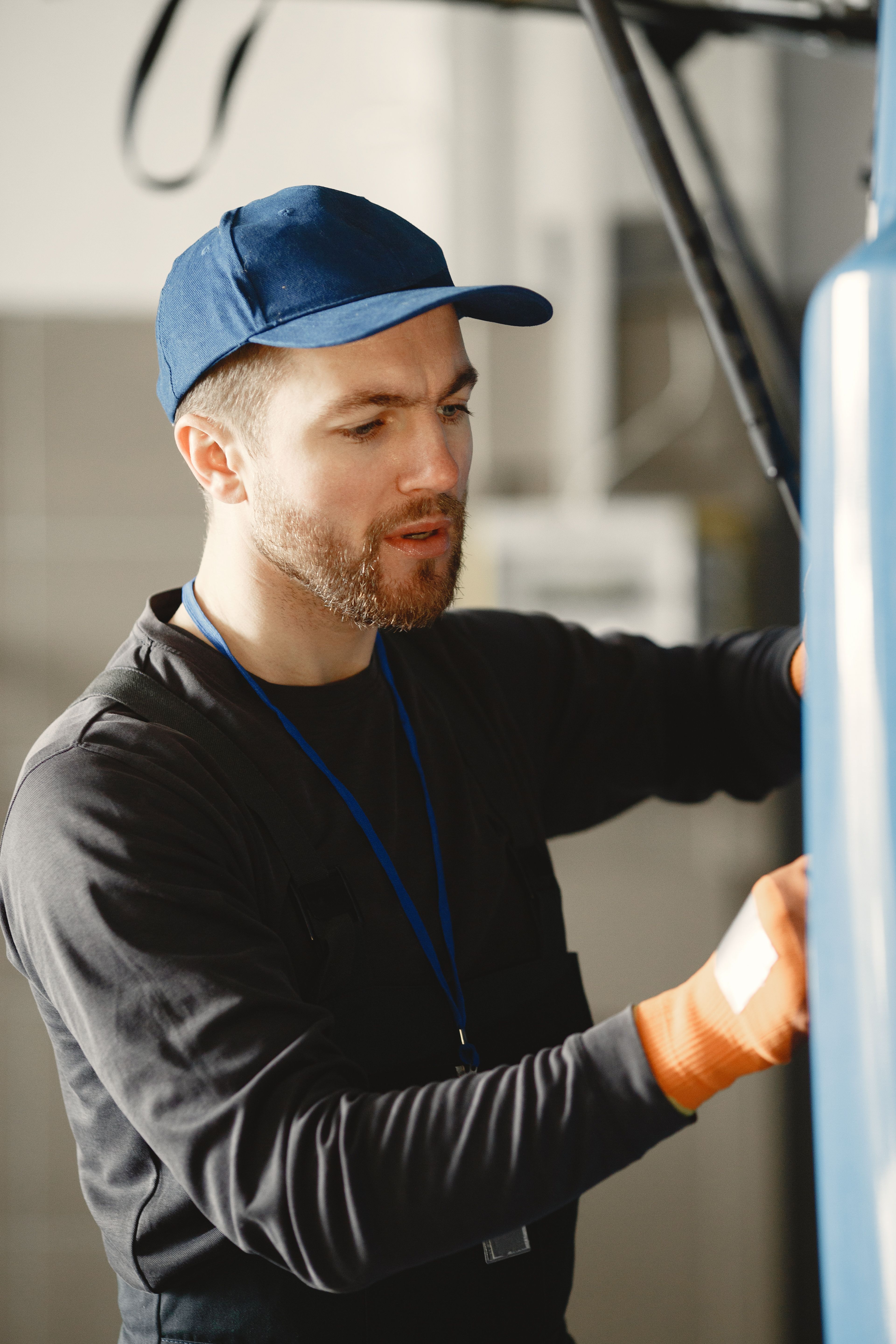 Professional technician repairing appliance